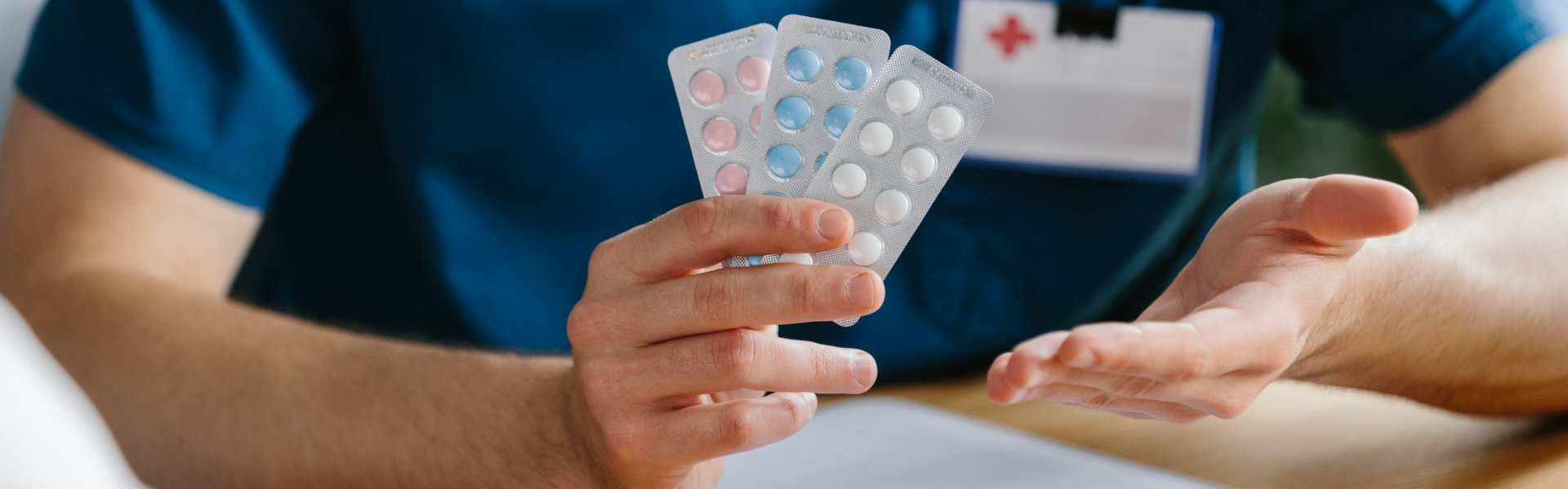a medical staff holding a medicines